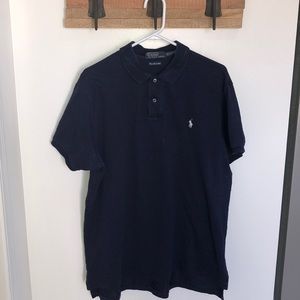 Navy collared shirt.